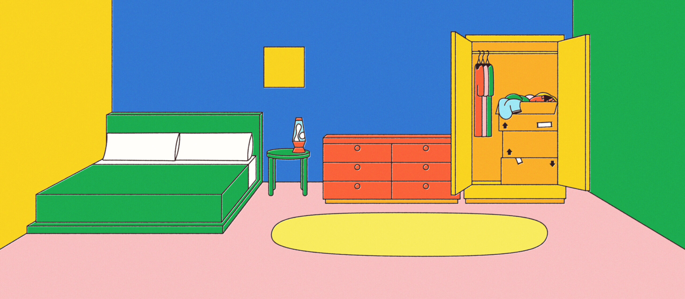 The bedroom has some more items in it such as a rug, lava lamp and bedding